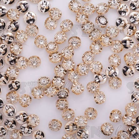 Пуговица пластиковая на ножке, размер 18L, форма круглая с волнистыми краями, цвет золотой, в центре шляпки белая страза фото 3