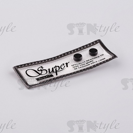 Аппликация пришивная ПВХ, полупрозрачная с надписью и черными заклепками, размер 65x25 мм, цвет белый фото 2